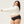 Vrouw in zwarte slip en witte trui, comfortabele damesmode, plus-size ondergoed, minimalistisch design, casual kledingstijl.