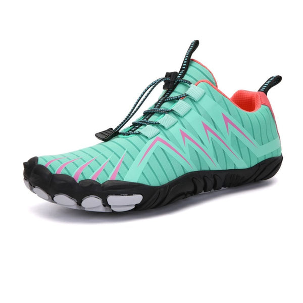 Mintgroene barefoot hardloopschoen met roze accenten, zwarte zool en elastische veters. Ideaal voor minimalistisch hardlopen en outdoor activiteiten.