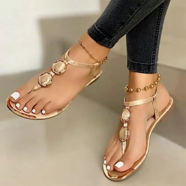 Gouden dames sandalen met strass, open teen en enkelbandje. Perfect voor zomermode en casual outfits. Comfortabele en stijlvolle schoenen.