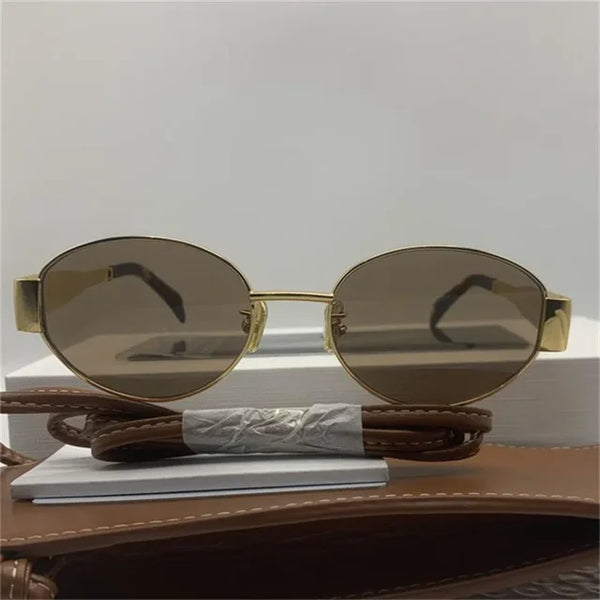 Gouden metalen ovale zonnebril met UV400 bescherming, unisex design, esthetisch merk, geschikt voor zomer, modieuze accessoire voor dames en heren.