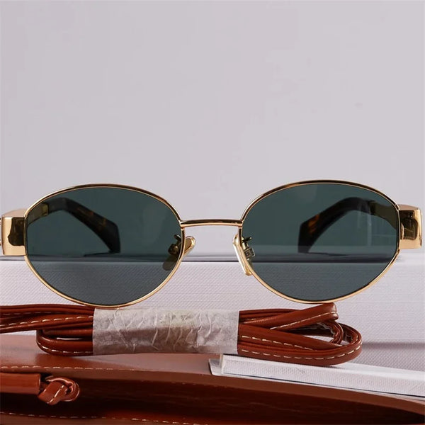 Gouden metalen ovale zonnebril met UV400 bescherming, unisex design, esthetisch merk, ideaal voor zomer, modieuze accessoire voor dames en heren.