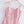 Roze zomerjurk met madeliefjesprint, spaghetti bandjes, hartvormige halslijn, op houten hanger. Perfect voor casual lente- en zomermode.