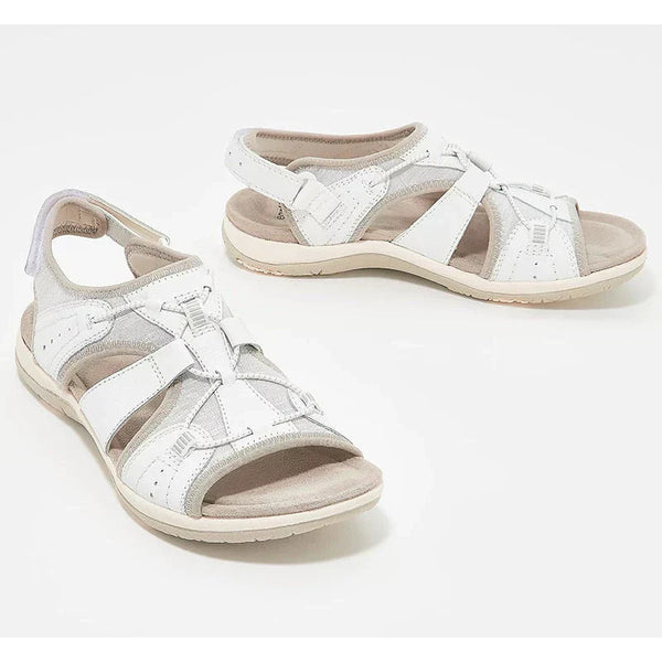 Witte leren sandalen voor dames met verstelbare bandjes en comfortabele zool, ideaal voor zomerse wandelingen. Stijlvol en functioneel schoeisel.