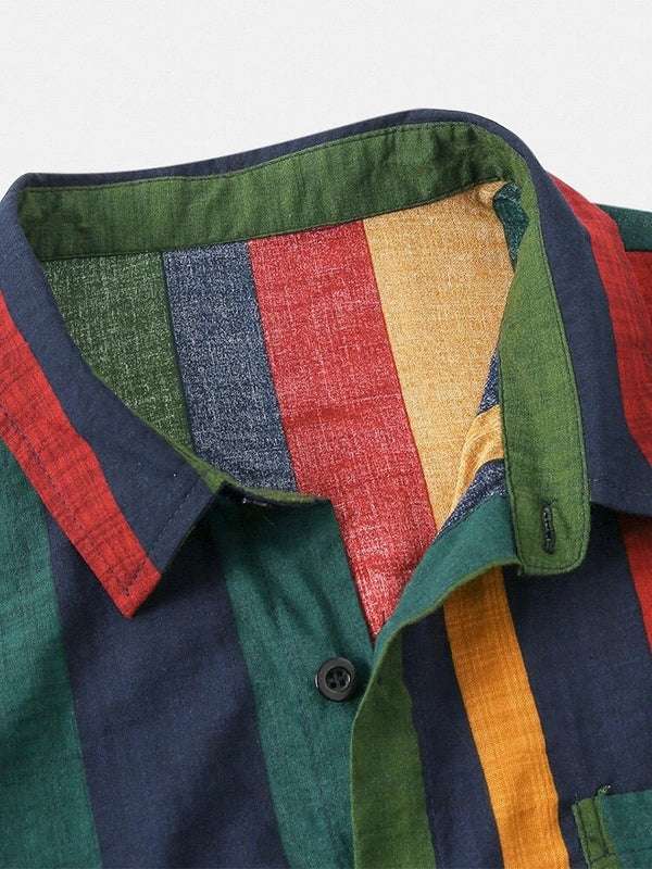 Gestreept overhemd met kleurrijke verticale banen in rood, groen, geel en blauw. Perfect voor casual mode en zomerse outfits. 100% katoen.