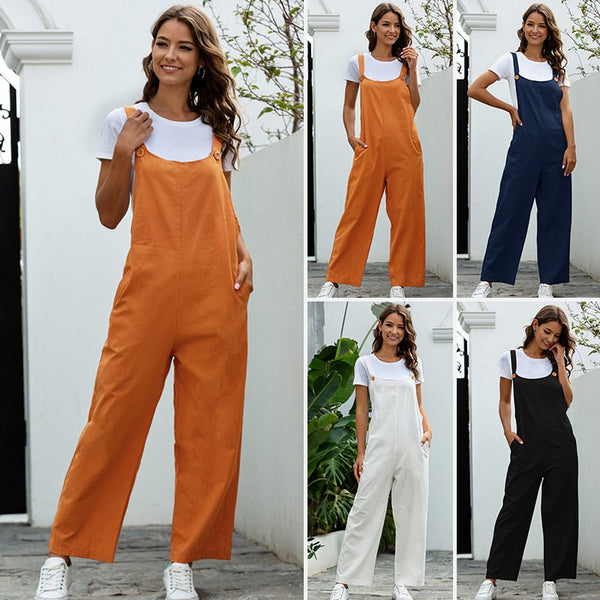 Vrouw in modieuze tuinbroek in oranje, blauw, wit en zwart. Casual dameskleding, comfortabele pasvorm, trendy stijl, perfecte zomeroutfit.