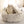 Witte kat in een zachte, pluche kattenmand, omgeven door lichte gordijnen. Comfortabele kattenbedden, huisdieraccessoires, gezellig huisdiermeubilair.