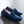 Blauwe suède loafers voor heren op natte ondergrond, stijlvolle casual schoenen, comfortabele pasvorm, ideaal voor dagelijks gebruik en modebewuste mannen.