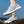 Grijze ademende sportschoenen voor dames, lichtgewicht en comfortabel, ideaal voor hardlopen en wandelen, met witte zool en mesh bovenwerk.