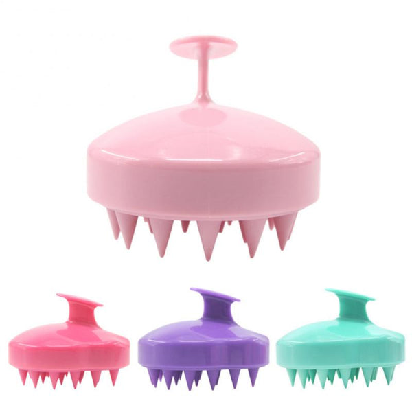 Roze siliconen hoofdhuidmassageborstel met handvat, ideaal voor haarverzorging en hoofdhuidstimulatie. Verkrijgbaar in roze, paars, groen.