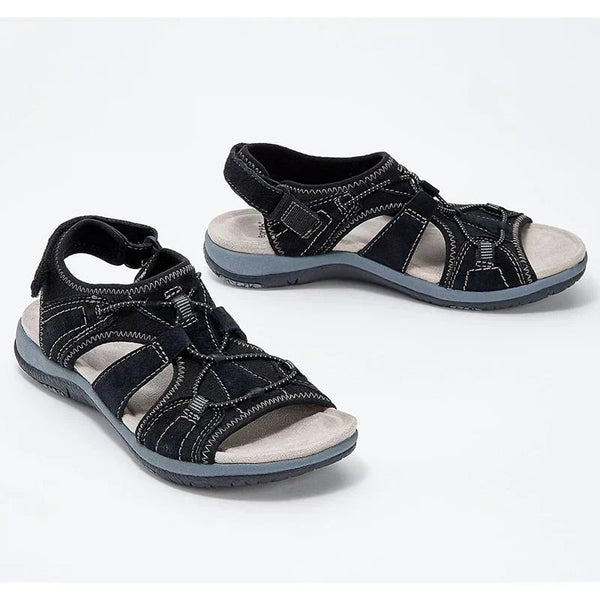 Zwarte leren sandalen met open teen en verstelbare bandjes, ideaal voor zomerse wandelingen. Comfortabele zool, perfect voor dagelijks gebruik.