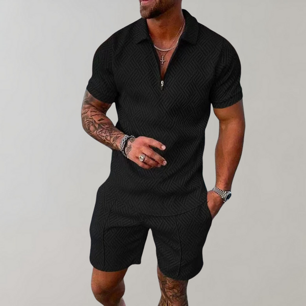 Zwart heren zomerset met korte mouwen en korte broek, stijlvolle geometrische print, ideaal voor casual zomeroutfits, modieuze herenkleding.