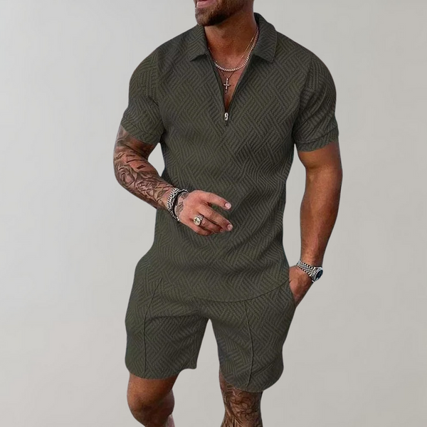 Donkergroen heren zomerset met korte mouwen en korte broek, geometrisch patroon, casual en stijlvol, perfect voor zomerse dagen.