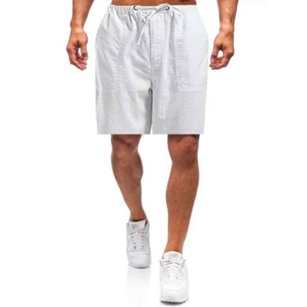 Witte katoenen herenshorts, casual en comfortabel, ideaal voor zomer, strand, fitness en basketbal. Losse pasvorm met trekkoord.