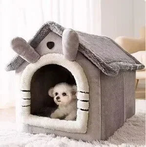 Grijze pluche hondenhuis met afneembaar kussen, geschikt voor kleine honden en katten. Comfortabel en warm huisdierbed voor binnengebruik.
