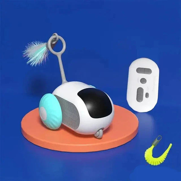 Interactief kattenspeelgoed met afstandsbediening, wit en blauw, op oranje platform. Inclusief pluizige staart en felgroene rups. Perfect voor kattenplezier.