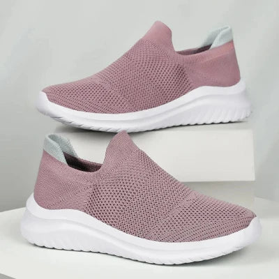 Roze ademende sportschoenen voor heren, zomer 2023. Lichtgewicht mesh design, ideaal voor casual en outdoor activiteiten. Comfortabele pasvorm.