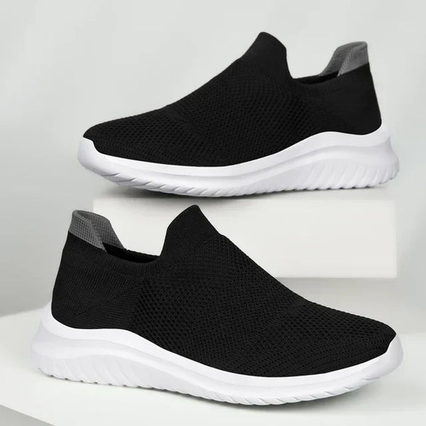 Zwarte ademende sportschoenen voor heren, zomer 2023. Lichtgewicht, casual en geschikt voor buitenactiviteiten. Modieuze mesh hardloopschoenen.