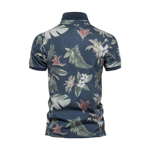 Donkerblauw poloshirt met tropische bloemenprint, korte mouwen en kraag. Perfect voor casual zomeroutfits. Herenmode, stijlvolle polo.