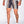 Stijlvolle heren zwemshort met Griekse patronen en gouden details, marineblauw en wit, ideaal voor strandmode en zomerse activiteiten.