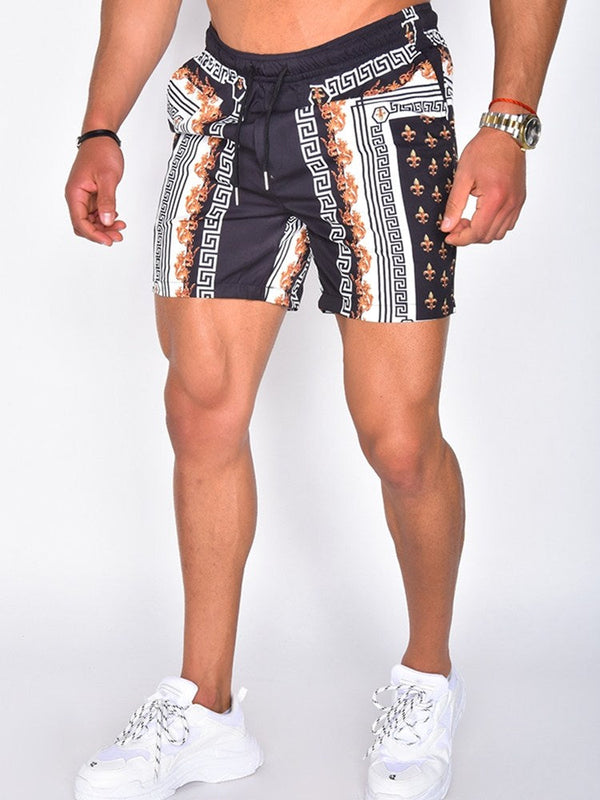 Stijlvolle heren zwemshort met Griekse patronen en gouden details, marineblauw en wit, ideaal voor strandmode en zomerse activiteiten.