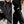 Vrouw in zwarte oversized hoodie en joggingbroek, modieuze streetwear, comfortabele casual outfit, witte sneakers, minimalistisch interieur.