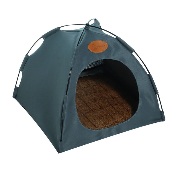 Donkergroene huisdierentent met open ingang, geschikt voor katten en kleine honden. Comfortabel, duurzaam ontwerp, ideaal voor binnengebruik.