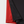 Zwart-rood gestreept herenpoloshirt, close-up van de zoom. Hoogwaardige stof, moderne stijl, perfect voor casual en zakelijke gelegenheden.