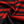 Gestreepte herenpoloshirt stof, zwart-rood patroon, close-up textuur. Hoogwaardige katoenen stof, modieuze kleding, comfortabele pasvorm.