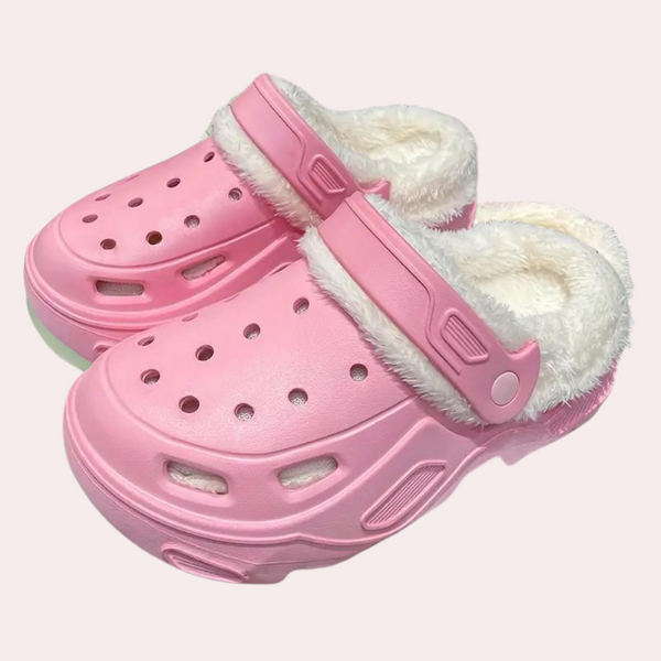 Roze pluche gevoerde klompen met ventilatiegaten en verstelbare band, ideaal voor comfort en stijl. Perfecte keuze voor casual en thuisgebruik.