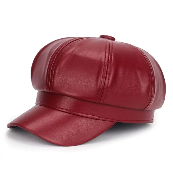 Bordeauxrode PU-leren schilderspet, cabbie-stijl, met een ronde kroon en korte klep. Modieuze baret voor dames en heren.