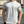 Grijze katoenen T-shirt voor heren, casual en comfortabel, ideaal voor dagelijks gebruik of sport. Perfecte pasvorm, modieus en veelzijdig.