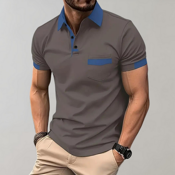 Grijze herenpolo met blauwe kraag en borstzak, korte mouwen, casual stijl. Perfect voor zomermode en vrijetijdskleding.
