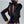 Zwarte satijnen blouse met open rug en strikdetail, elegante damesmode, stijlvolle avondkleding, chique design, modetrend 2023.