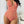Rood-wit gestreept badpak met diepe V-hals, gedragen door vrouw. Trendy damesbadmode, zomerstijl, strandkleding, modieuze zwemkleding.