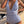 Gestreept badpak voor dames met diepe V-hals, blauw-wit patroon, zomermode, strandkleding, stijlvolle zwemkleding, trendy design.