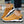 Casual bruine herenschoenen met witte zool en zwarte accenten, ideaal voor wandelen. Comfortabele, modieuze sneakers voor dagelijks gebruik.