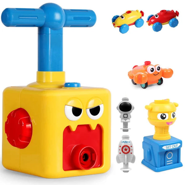 Gele ballonpomp speelgoedset met grappige gezichten, inclusief kleurrijke autootjes en raketten. Educatief en interactief kinderspeelgoed.