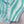 Gestreepte turquoise en witte bikini op beige achtergrond, strandmode, zomerkleding, trendy zwemkleding, damesbadmode, stijlvolle strandoutfit.