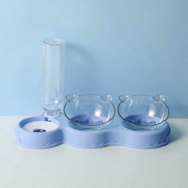 Blauwe huisdier voerbak set met twee doorzichtige kommen en waterfles, ideaal voor katten en kleine honden. Modern design, duurzaam materiaal.