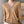 Vrouw draagt beige V-hals trui met knopen, stijlvolle casual damesmode, herfstkleding, comfortabele en elegante outfit voor dagelijks gebruik.