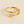 Gouden ring met hart en sierlijke letter 