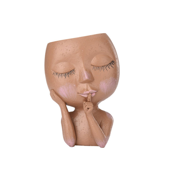 Stijlvolle plantenpot in de vorm van een gezicht met gesloten ogen en vinger op de lippen, ideaal voor moderne interieurdecoratie.