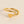 Gouden ring met hart en letter D, minimalistisch ontwerp, gepolijst, perfect als gepersonaliseerd sieraad of cadeau, elegant en stijlvol.