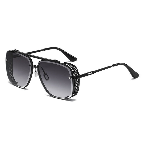 Zwarte piloten zonnebril met grijze glazen en metalen frame, stijlvolle unisex zonnebril, UV-bescherming, modieuze accessoire voor heren en dames.