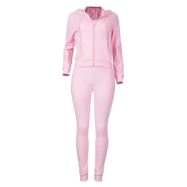 Roze dames trainingspak met capuchon en rits, bestaande uit een hoodie en strakke broek. Perfect voor sport en casual mode. Comfortabel en stijlvol.