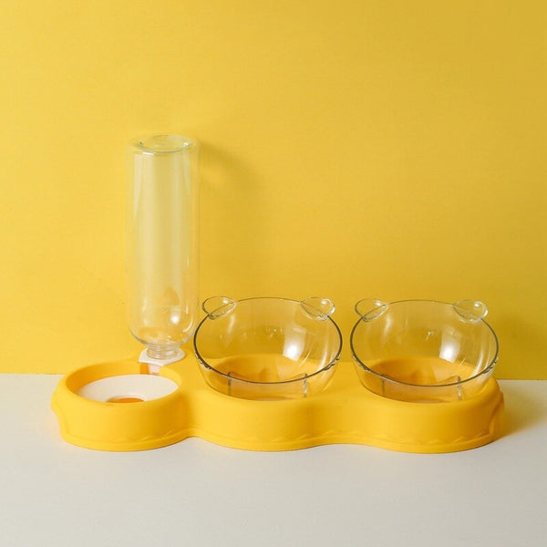 Gele huisdier voerbak set met twee glazen kommen en waterdispenser, ideaal voor katten en honden. Stijlvol en functioneel ontwerp voor huisdieren.