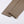 Opgerolde beige broekspijpen van ribstof op witte achtergrond, modieuze casual kleding, detailopname.