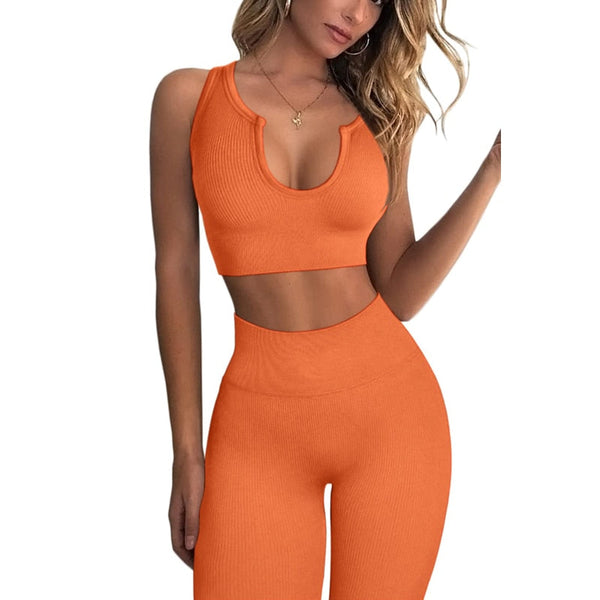 Oranje naadloze sportset voor dames, bestaande uit een crop top en hoge taille legging. Perfect voor yoga, fitness en actieve levensstijl.