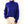 Blauwe gebreide trui met kabelpatroon, hoge hals en lange mouwen, gedragen door model. Perfect voor wintermode en casual outfits.