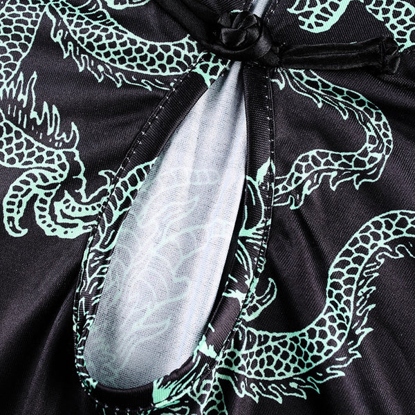 Zwart sportshirt met groene drakenprint en open rugdetail. Perfect voor fitness en yoga. Hoogwaardige stof, ademend en stijlvol design.